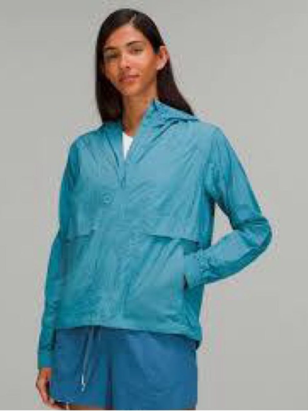 lululemon Hood Lite packable jacket in a light teal.. Size 8